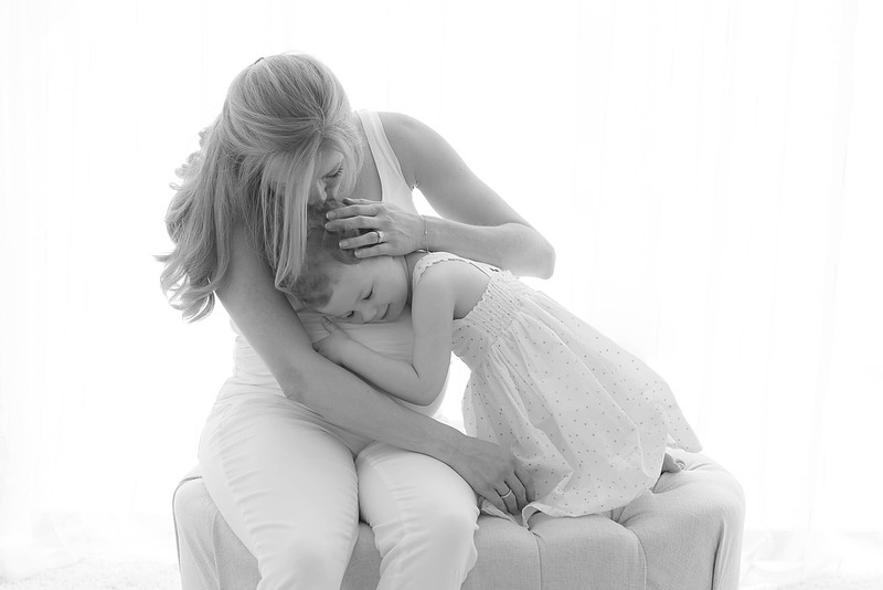 Black and white portrait of a mother and daughter
