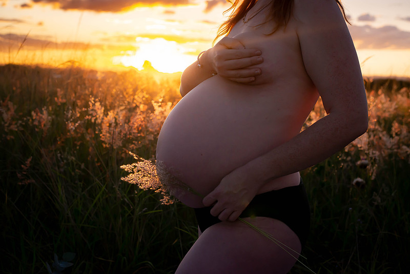 Golden-hour maternity portrait